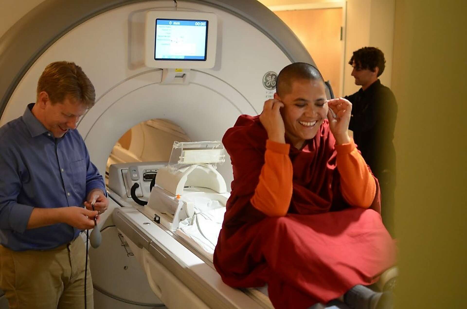 Meditator preparing for an MRI scan in a contemplative neuroscience lab